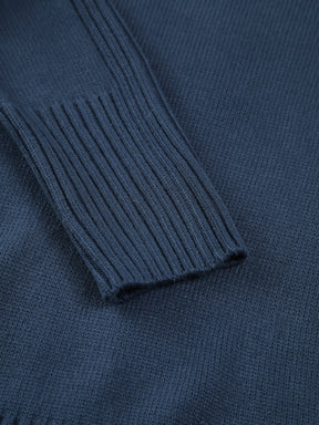 Bianca – Maglione a collo alto in maglia tinta unita